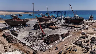 Aerial view of shipyard construction activity